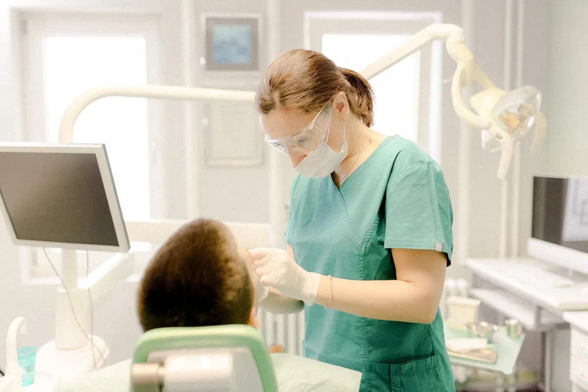 Dentist treating a patient